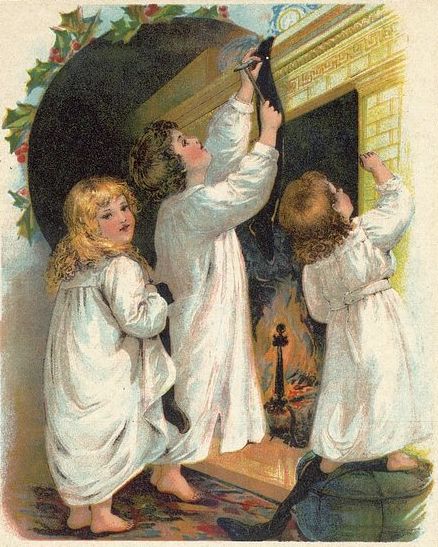 Christmas Stockings and Old Saint Nick. Children Hanging Christmas Stockings